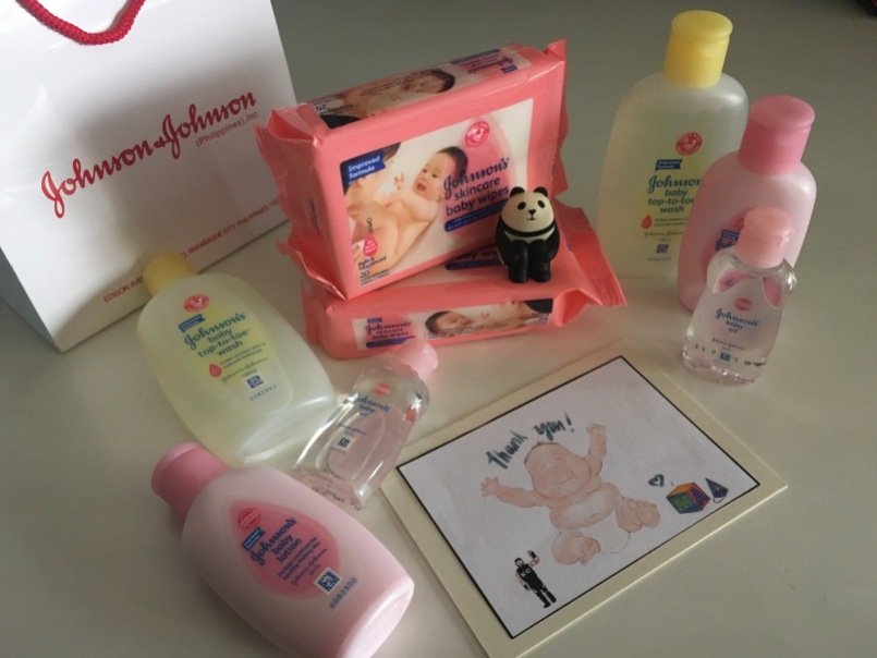 J&J goodies: wipes, baby oil, body wash, and lotion.